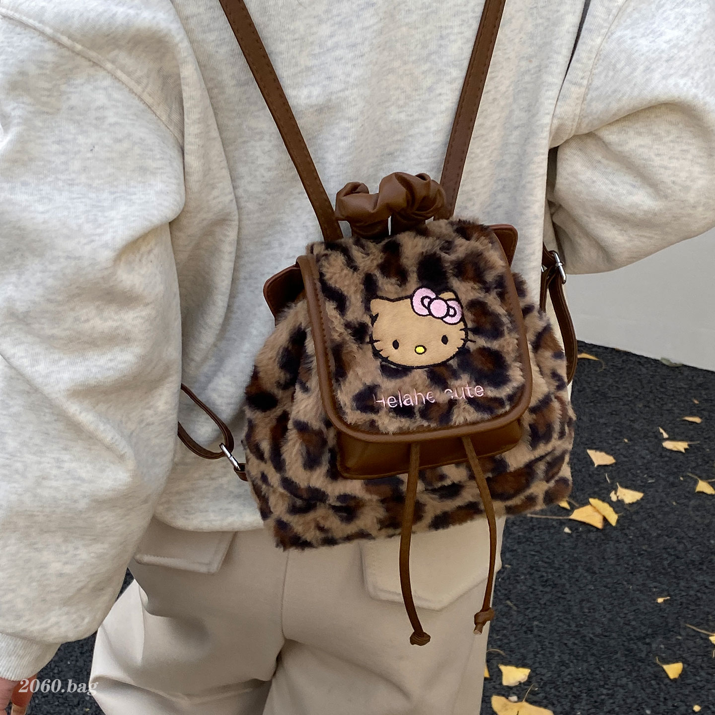 可爱猫咪豹纹毛绒双肩包女2025新款时尚百搭背包韩版ins休闲旅行
