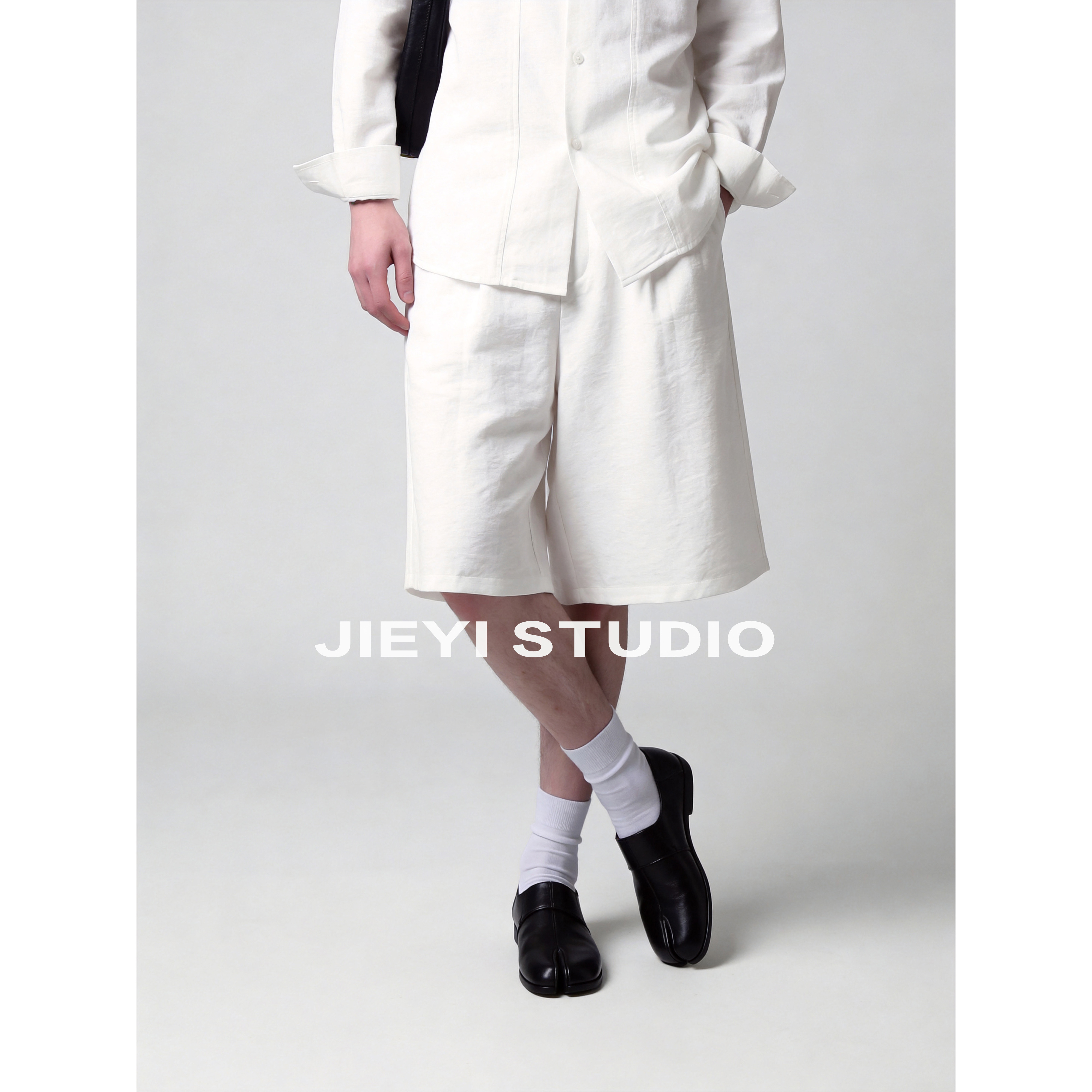 JIEYI 半松紧腰仿麻肌理感男士阔腿短裤双折线老钱通勤风五分中裤