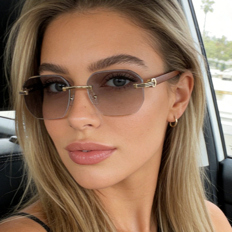 2026春季新品太阳镜无框切边变色眼镜户外摆拍凹造型防紫外线眼镜