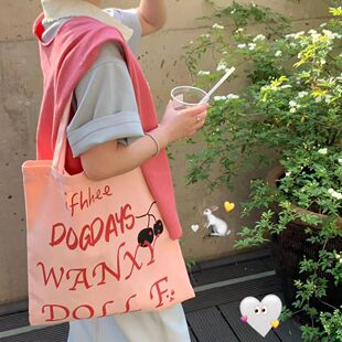慵懒粉色印花字母单肩包女学生大容量帆布包百搭上课通勤手提袋