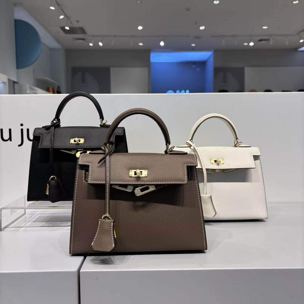 OMI欧米女包新款头层牛皮时尚百搭高级感小众设计手提斜挎包