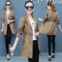 Áo gió nữ Waitmore mùa xuân và mùa thu mới 2019 đầu thu nhỏ người đàn ông áo dài khí chất - Trench Coat áo da nữ dáng dài