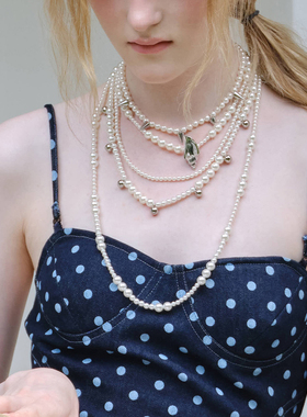 珍珠钛钢铆钉海螺层叠组合项链