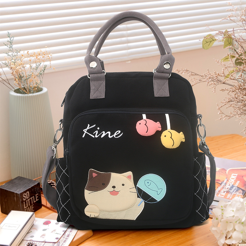 Kine猫 可爱戏鱼猫手提斜挎包卡通帆布百搭学生双肩背包书包女