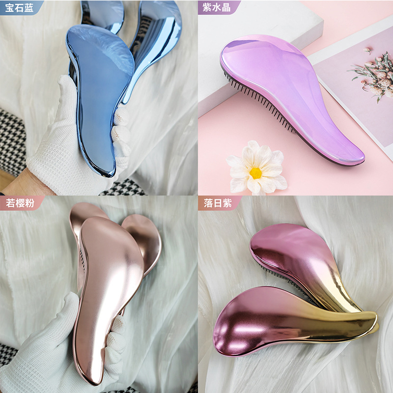 跨境电镀喷漆TT防打结顺发梳子 女发梳家用按摩软齿直发魔法梳子