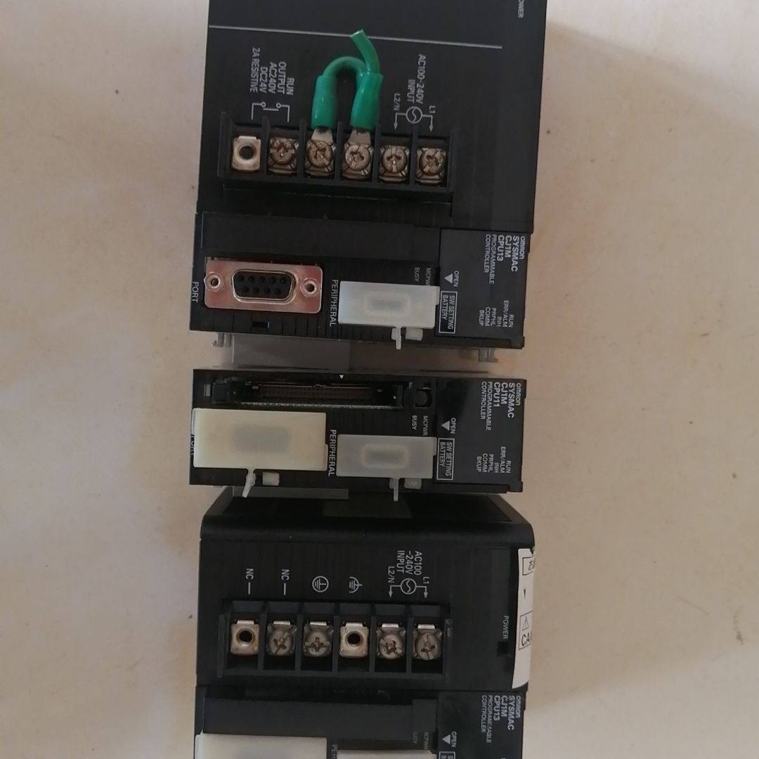 PLC 型号：CJ1W-PA205R CJ1M-C