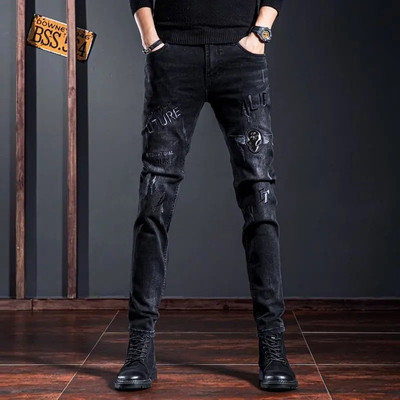 潮牌个性刺绣牛仔潮流修身小脚裤