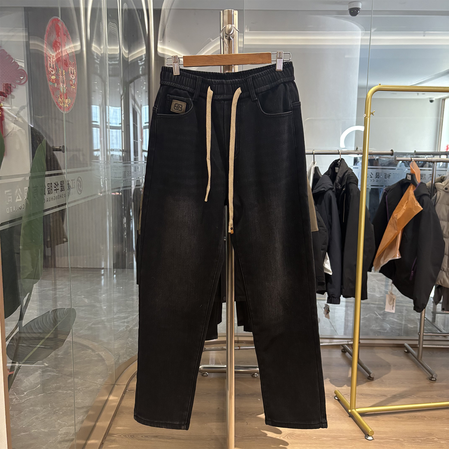 商场单时尚简约松紧腰直筒牛仔裤