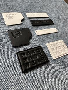 高品质皮标服装辅料可定制服装真皮填充凹凸感辅料配件吊牌皮牌