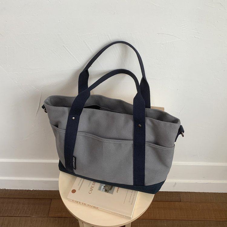 文艺休闲纯色帆布托特包2026新款日杂风手提妈咪包单肩斜挎大包女