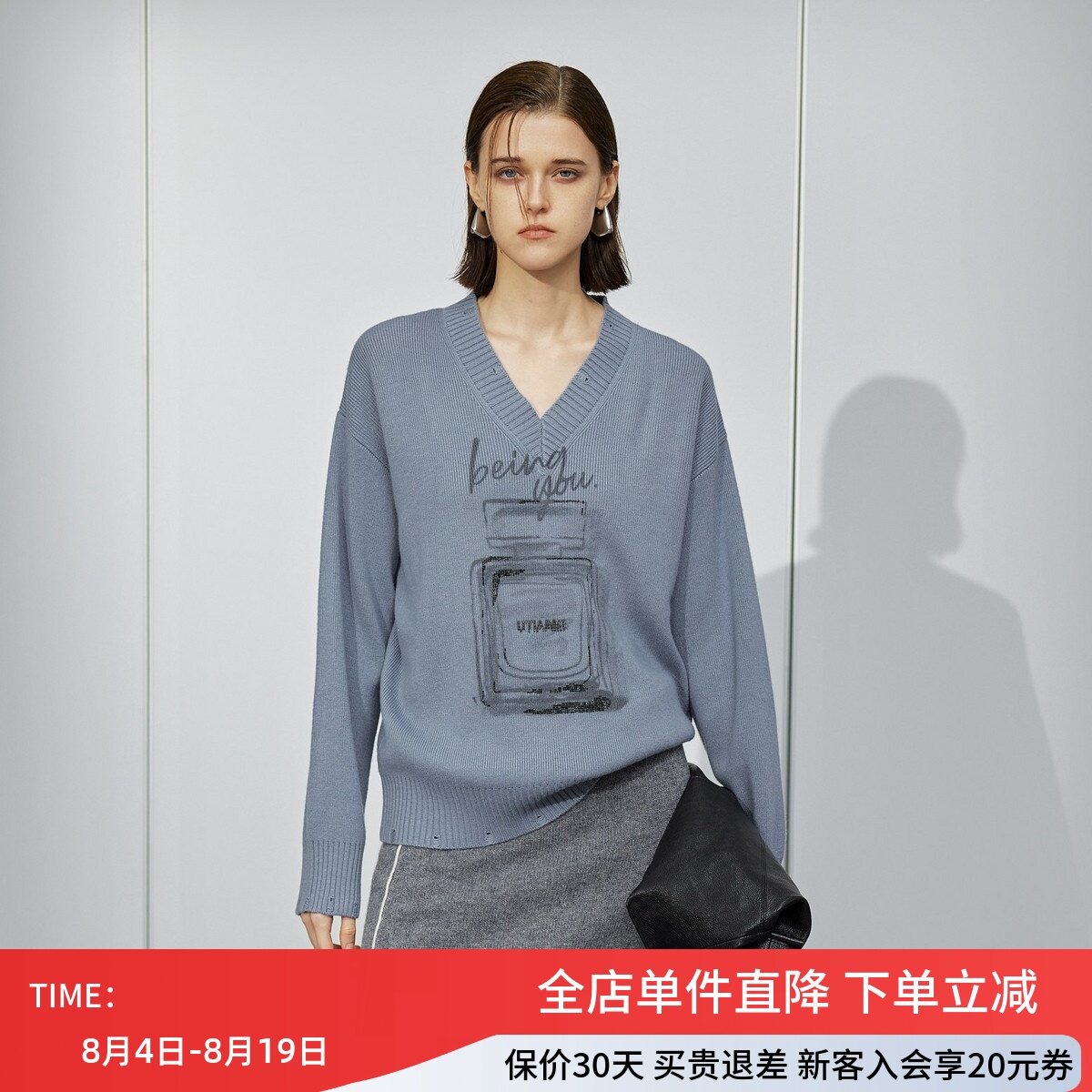 uti尤缇2025秋季新款 香水印花宽松休闲V领套头毛衣女UK361131127