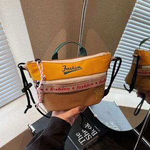 2026夏季新款时尚洋气男女同款简约撞色饺子包运动风单肩包斜挎包