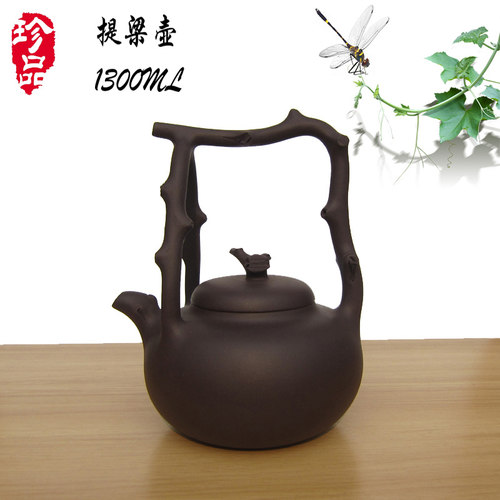 宜兴紫砂周桂珍提梁茶壶