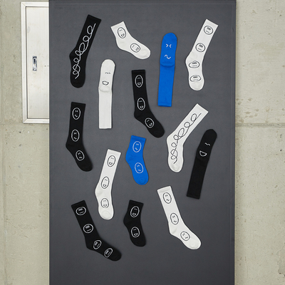 逗趣笑脸情侣纯棉简约随意中筒袜