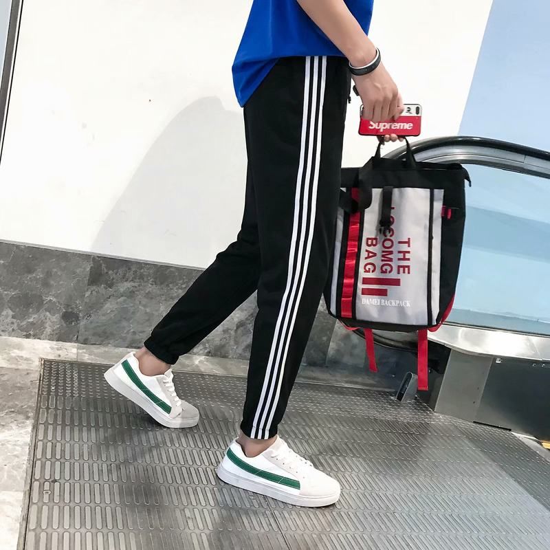 春秋季韩版款潮流学生白条运动裤2022裤子休闲学院风潮流九分男女