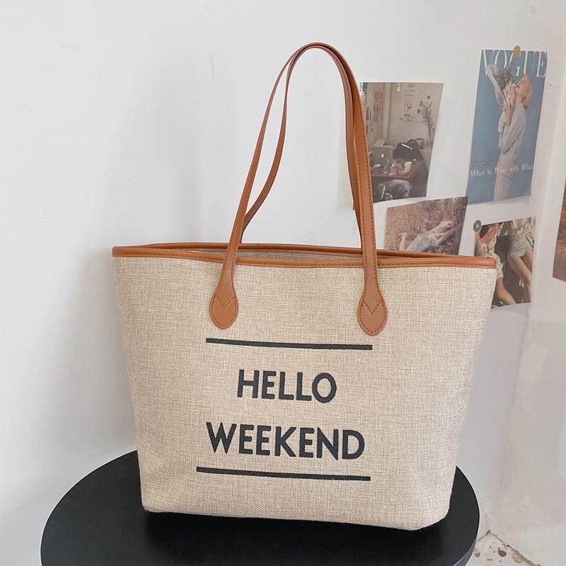 包包女2022时尚简约大容量手提女包纯色字母印花购物袋帆布托特包