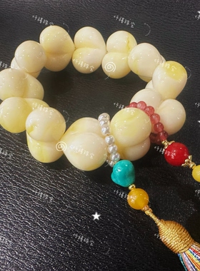 仟禧秋冬新品爆款奶白屁桃原创设计款手串女款高颜值琥珀流苏手串