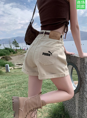 官网奥莱牛仔短裤女夏2025年新款高腰显瘦a字卷边辣妹短裤设计感