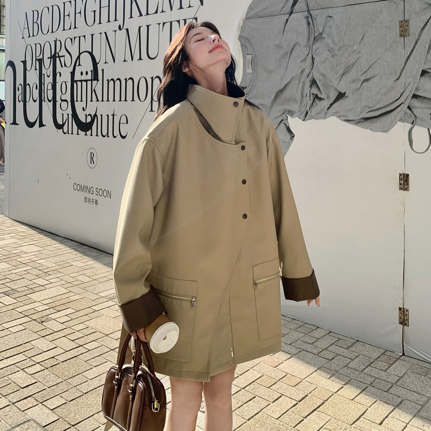 设计感卡其色撞色拼皮风衣外套女2025秋款英伦风高级感中长款大衣图片
