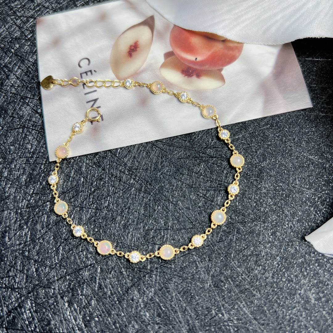 星赞轻奢珠宝S925银镶嵌天然澳宝欧泊正圆形切割耳钉耳饰简约精致