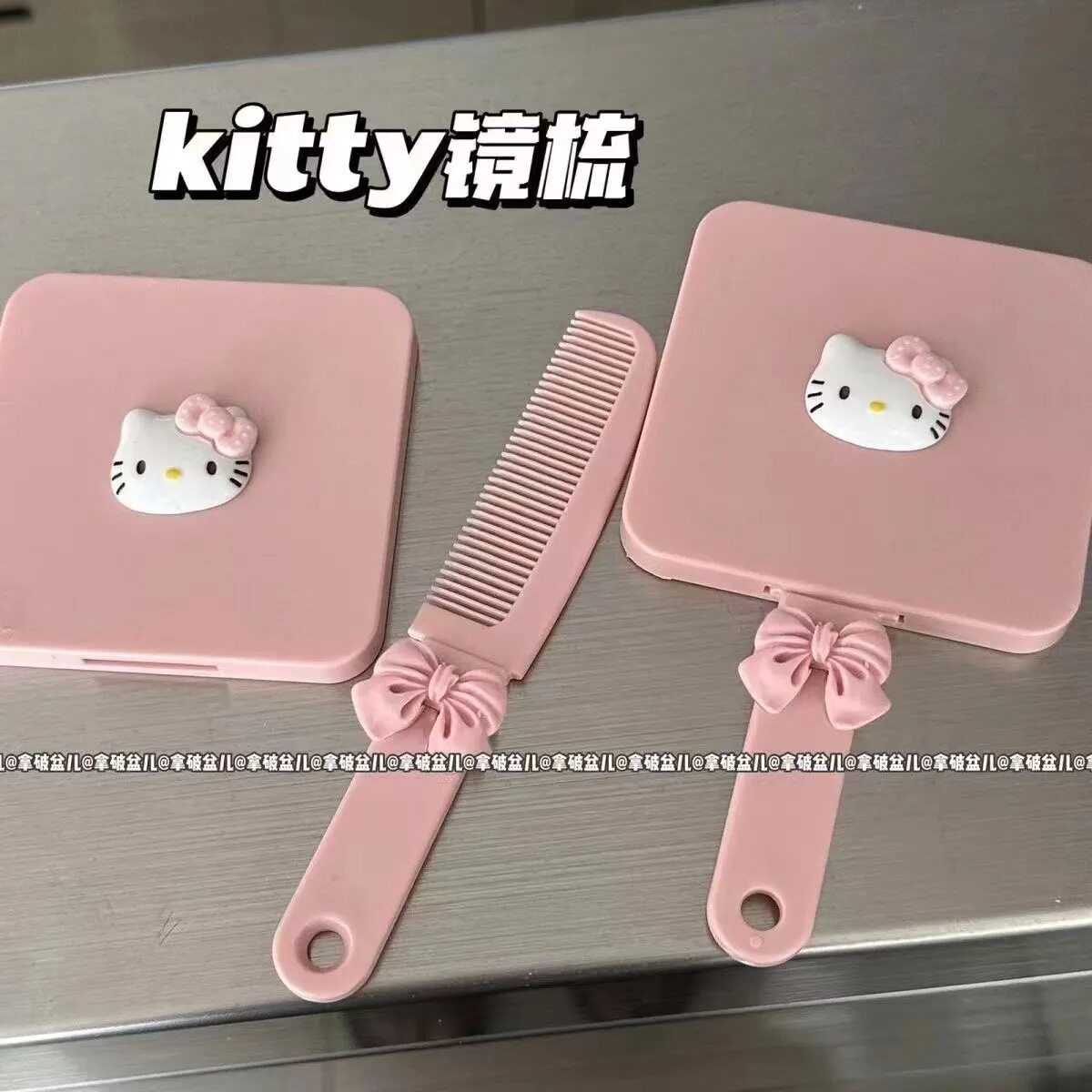 新款kitty猫手柄镜带梳子便携手持化妆镜少女心镜梳一体小镜子