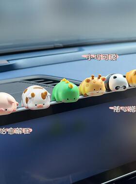 A cute little animal partyer with a cappuccino car set-up fo