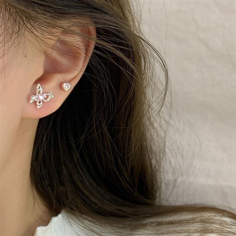 The pink sweet butterflies with little silver pins, and the