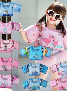 Childrens caps, vests, parachutes. Young kids learn swimmin