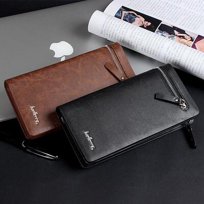 Businessman grabs a bag of mens wallets and a long zipper g