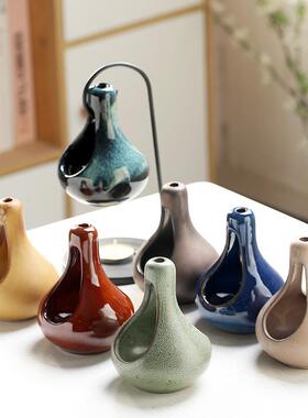 The creative iron rack is tied to a four-colour kiln to a po