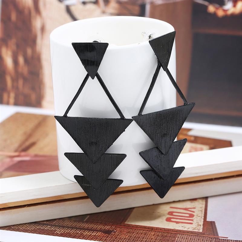 An original geometric triangle of pure black alloys and long