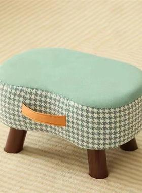 Little stools on the couch in the stool room, a few short st