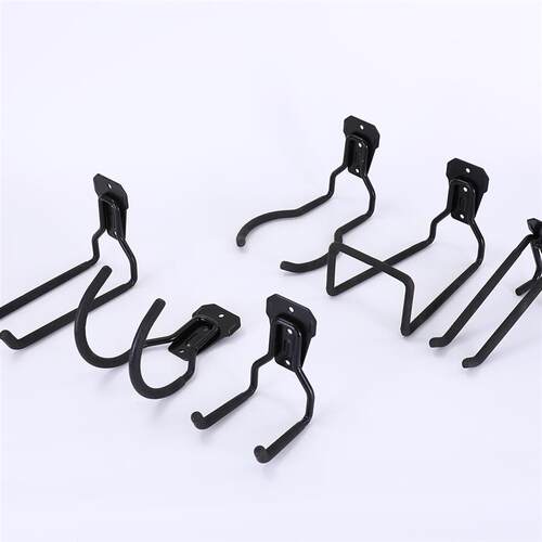 Metal hooks on the wall wall attached to the garden garage o