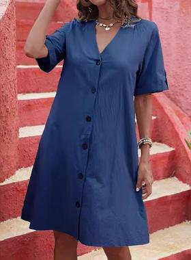 A beautiful woman wears a dress and washes a tampon short sl