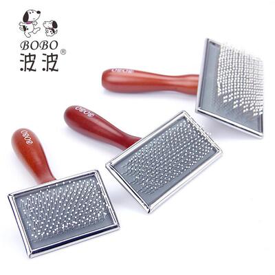Puppet needle combing the dogs beauty comb, cat combing the