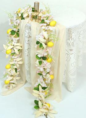 Simulate a lemon twig of lemon leaves and grass and a green