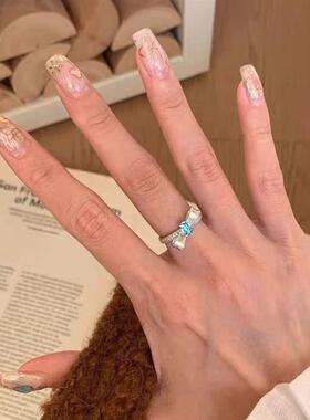 Sea-blue butterflies ring with an ancient wind mossed with a