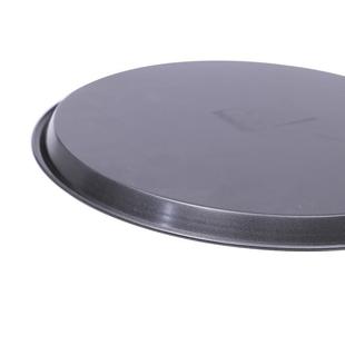 A variety of sizes of deep-grey carbon steel pizza plates wi