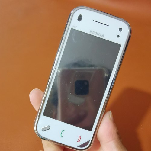 诺基亚n97 mini全新库存整机原膜经典侧翻功能正常实拍图
