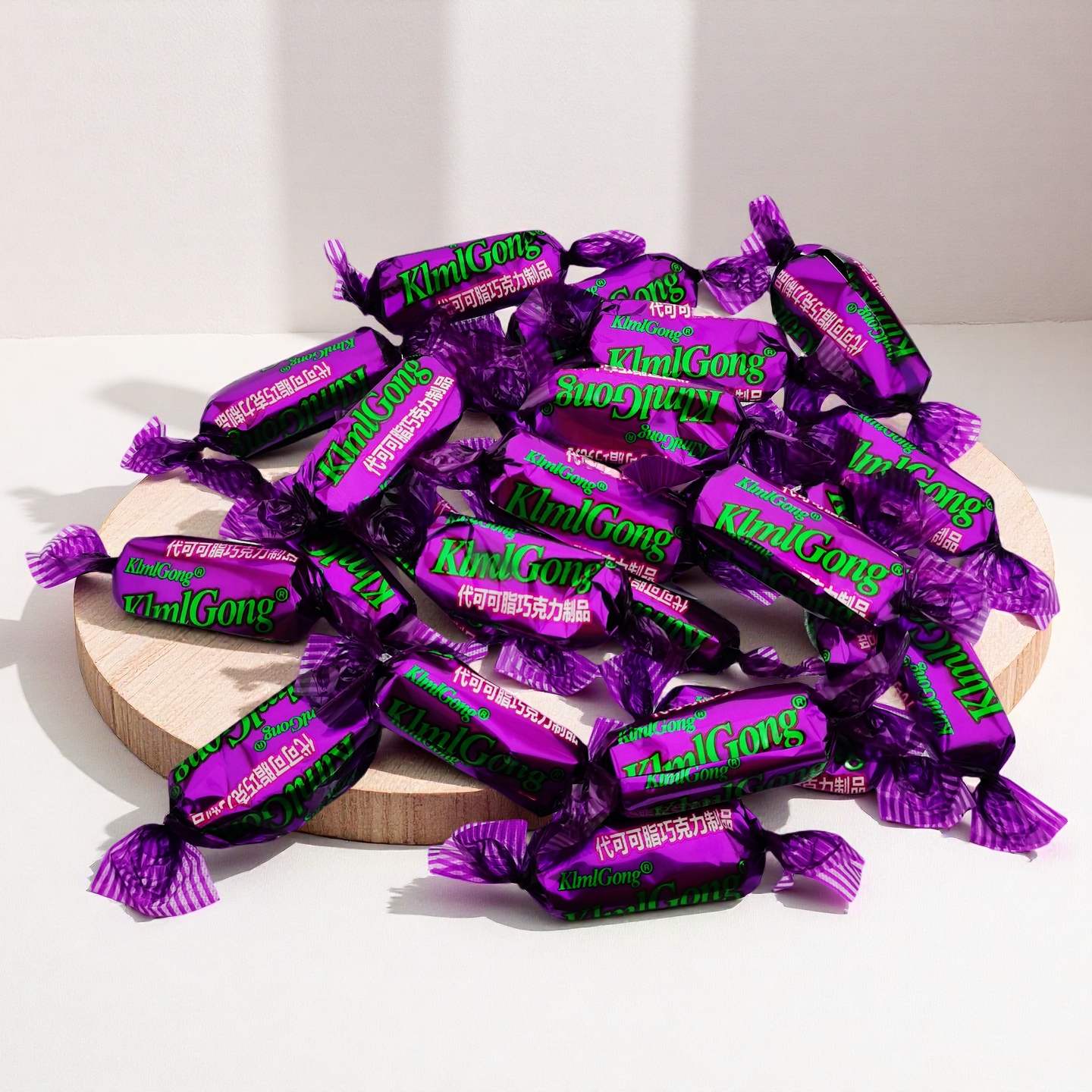 国产紫皮糖果仁夹心花生糖拉丝高粱饴休闲零食夹心巧克力小包装