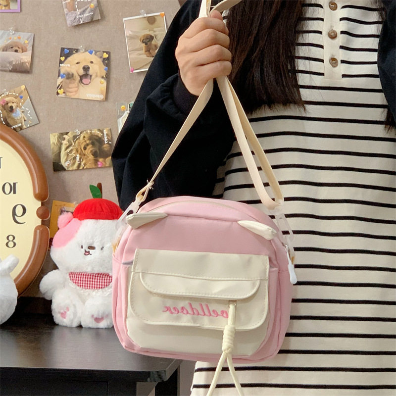 小清新甜美撞色斜挎包女春季新款