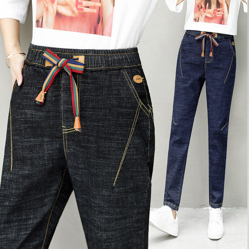 以纯官方旗舰店2020流行裤子松紧腰牛仔小脚裤轻薄高腰显示哈伦裤