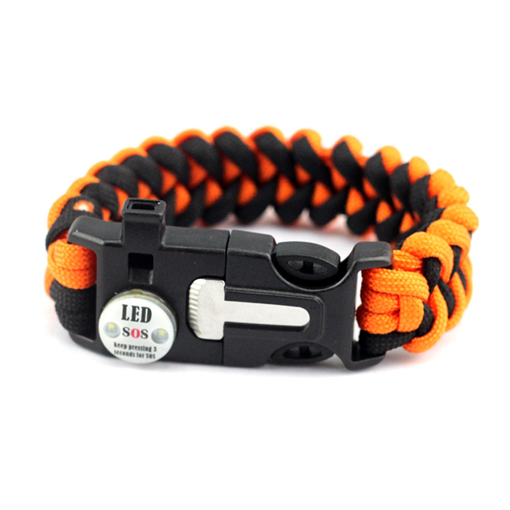 户外应急求生手链 七芯伞绳手工编织口哨ledsos求救灯打火石手环