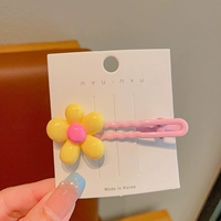 Желтые шпильки для волос в форме цветка