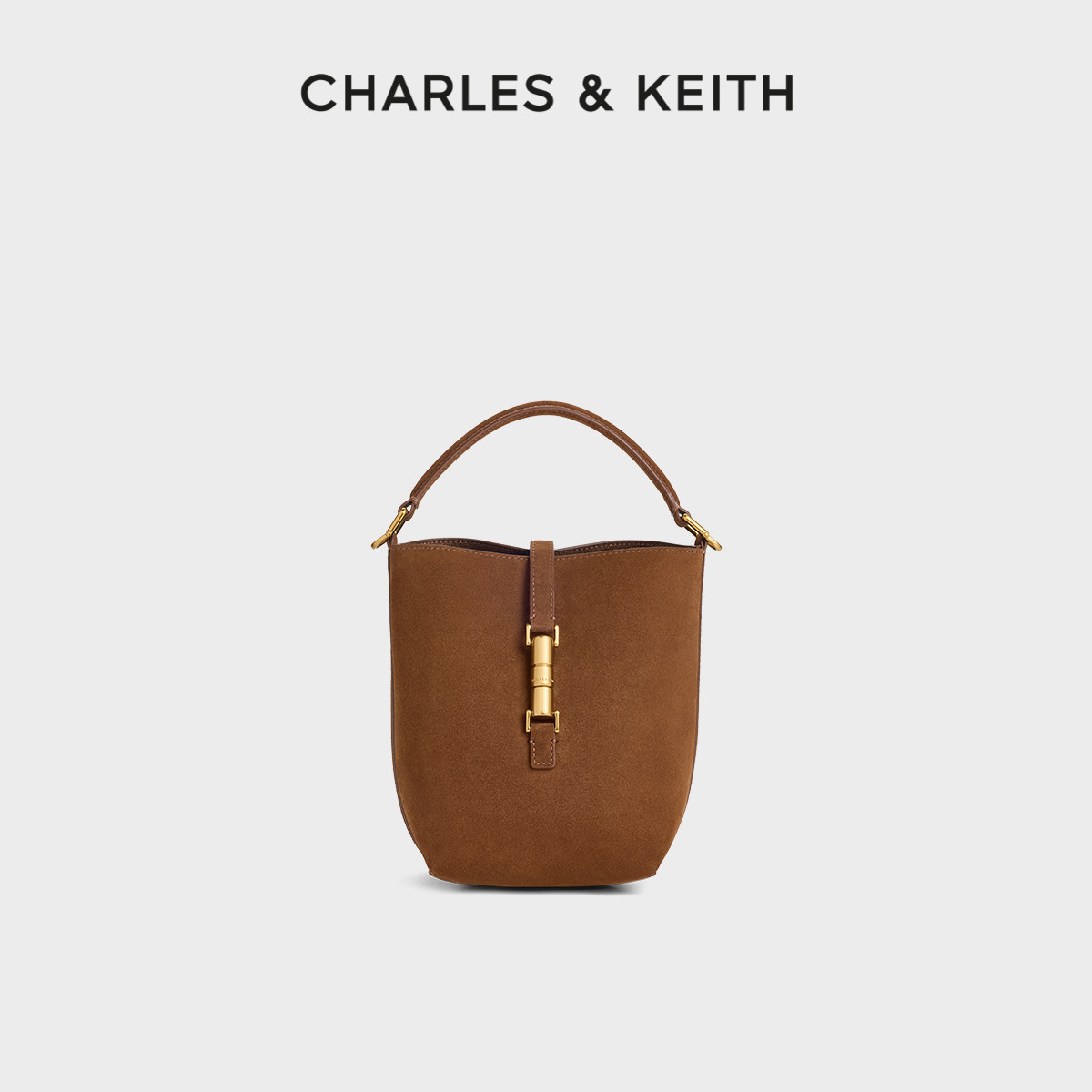 CHARLES&KEITH26秋新款CK2-10770769-1复古绒面金属扣子母水桶包