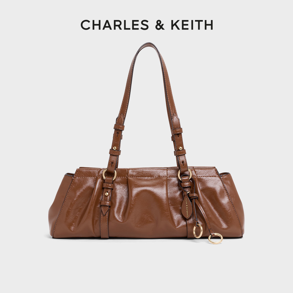 CHARLES&KEITH25冬新款CK2-30671819复古包挂腋下包法棍包饺子包