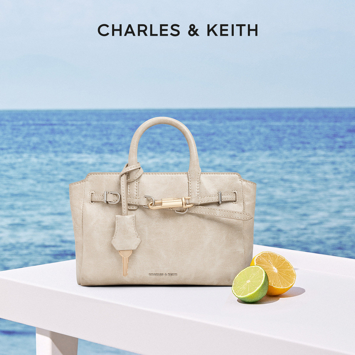 CHARLES&KEITH26春季新款CK2-30271702锁扣褶皱手提凯莉包斜挎包