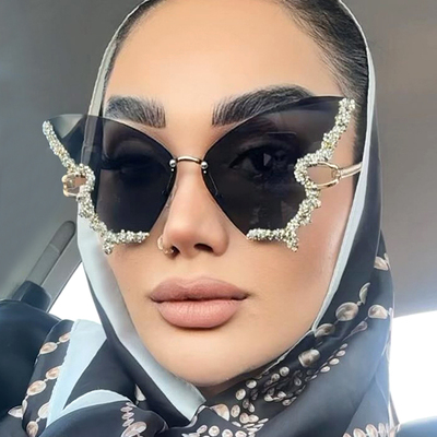 镶钻太阳镜无框防紫外线女蝶形