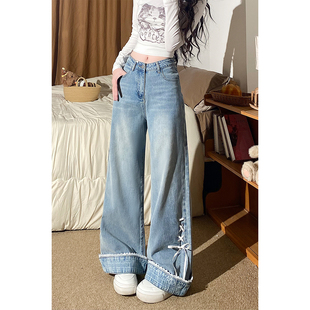 自然涩蝴蝶结绑带小众翻边牛仔裤女2026早春新款直筒阔腿裤子春季