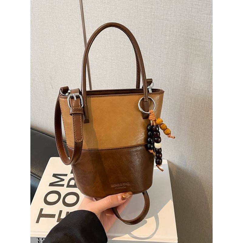 专柜品牌韩国麂皮绒双拼撞色水桶包女2025秋冬新时尚百搭斜挎包单,箱包皮具/热销女包/男包,水桶包,淘宝优惠券,粉丝福利购,淘宝优惠卷